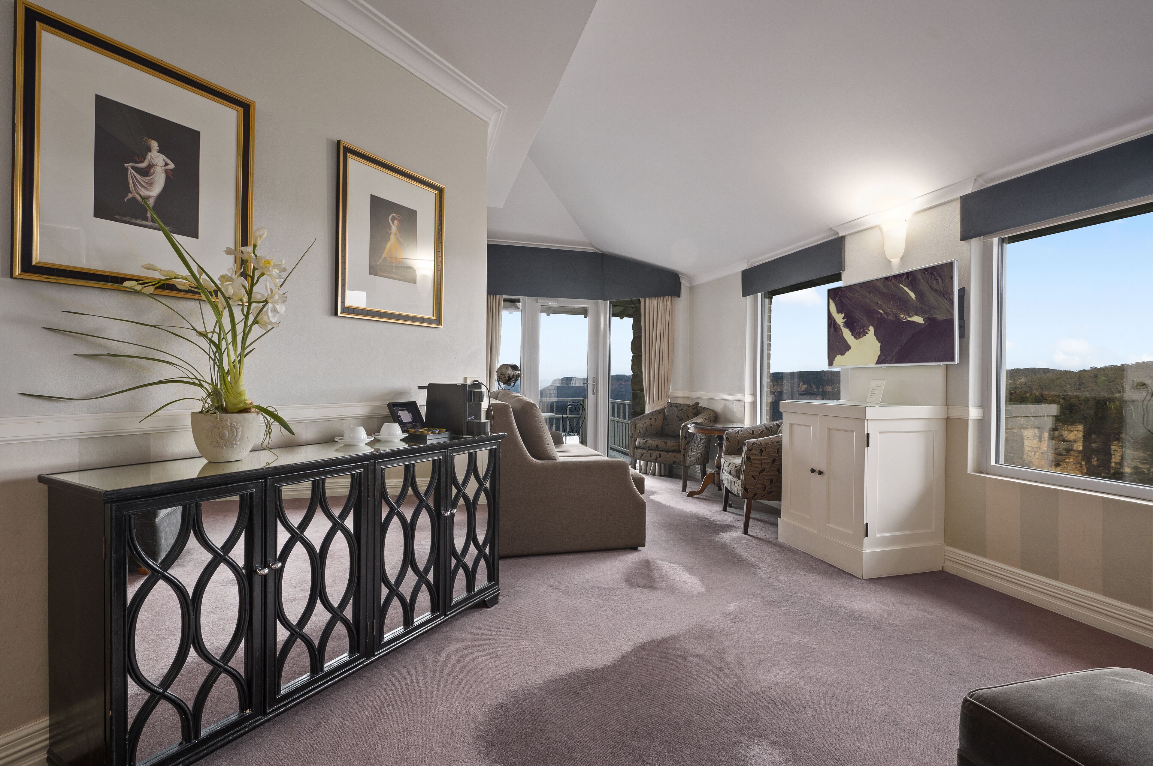 corner view suite | living area | lcd tv