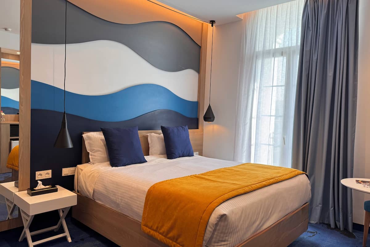 Chambre Deluxe | Literie de qualité supérieure, minibar, coffres-forts dans les chambres