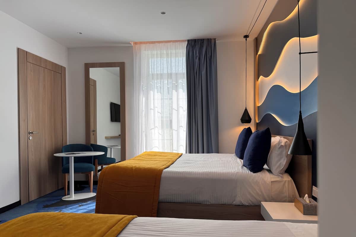 Family Room | Premium bedding, minibar, in-room safe, individually furnished