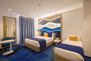 Family Room | Premium bedding, minibar, in-room safe, individually furnished - Hotel Carlton (Tunis)