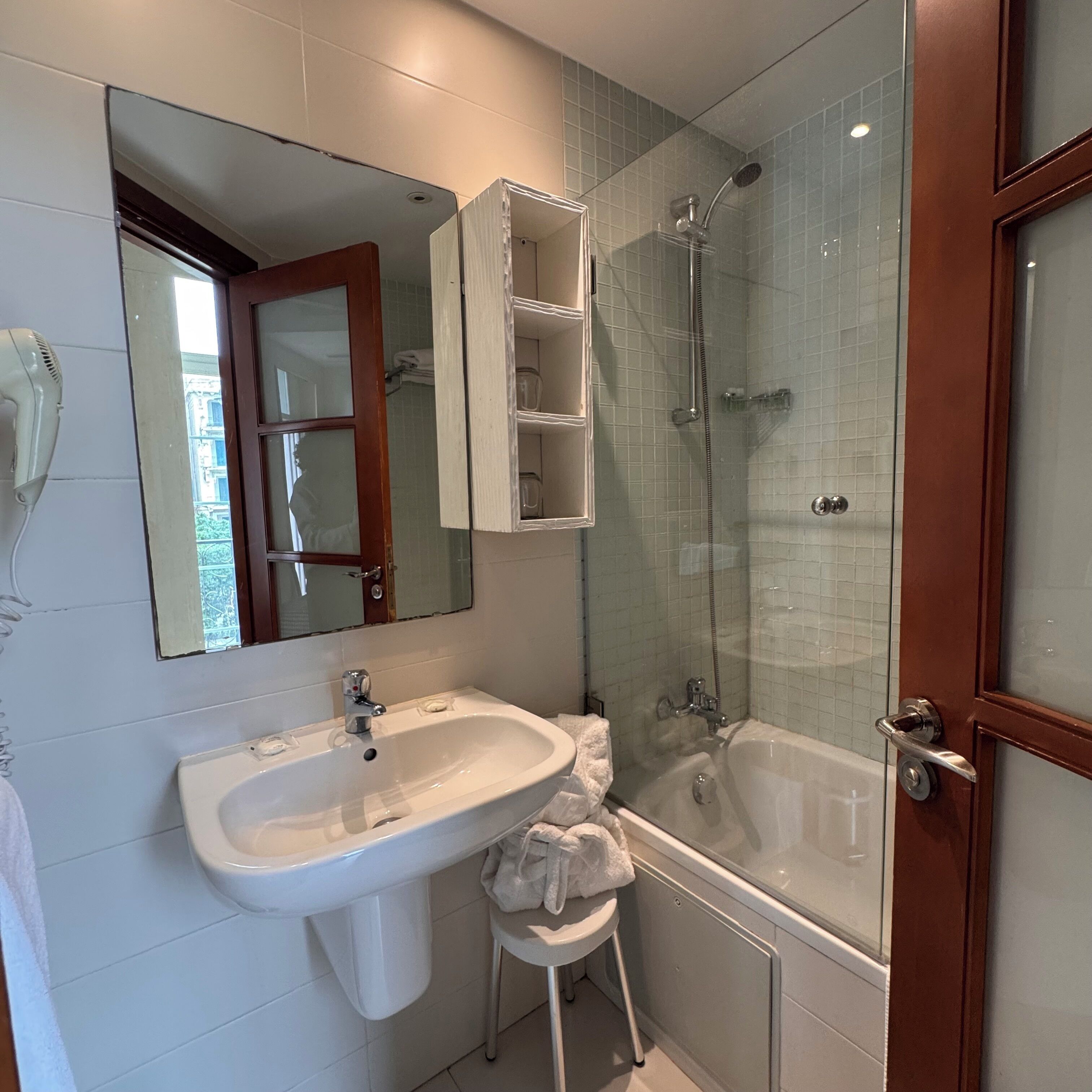 family room | bathroom | rainfall showerhead, free toiletries, hair dryer, slippers