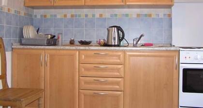 At the Golden Plough Apartments