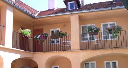 At the Golden Plough Apartments