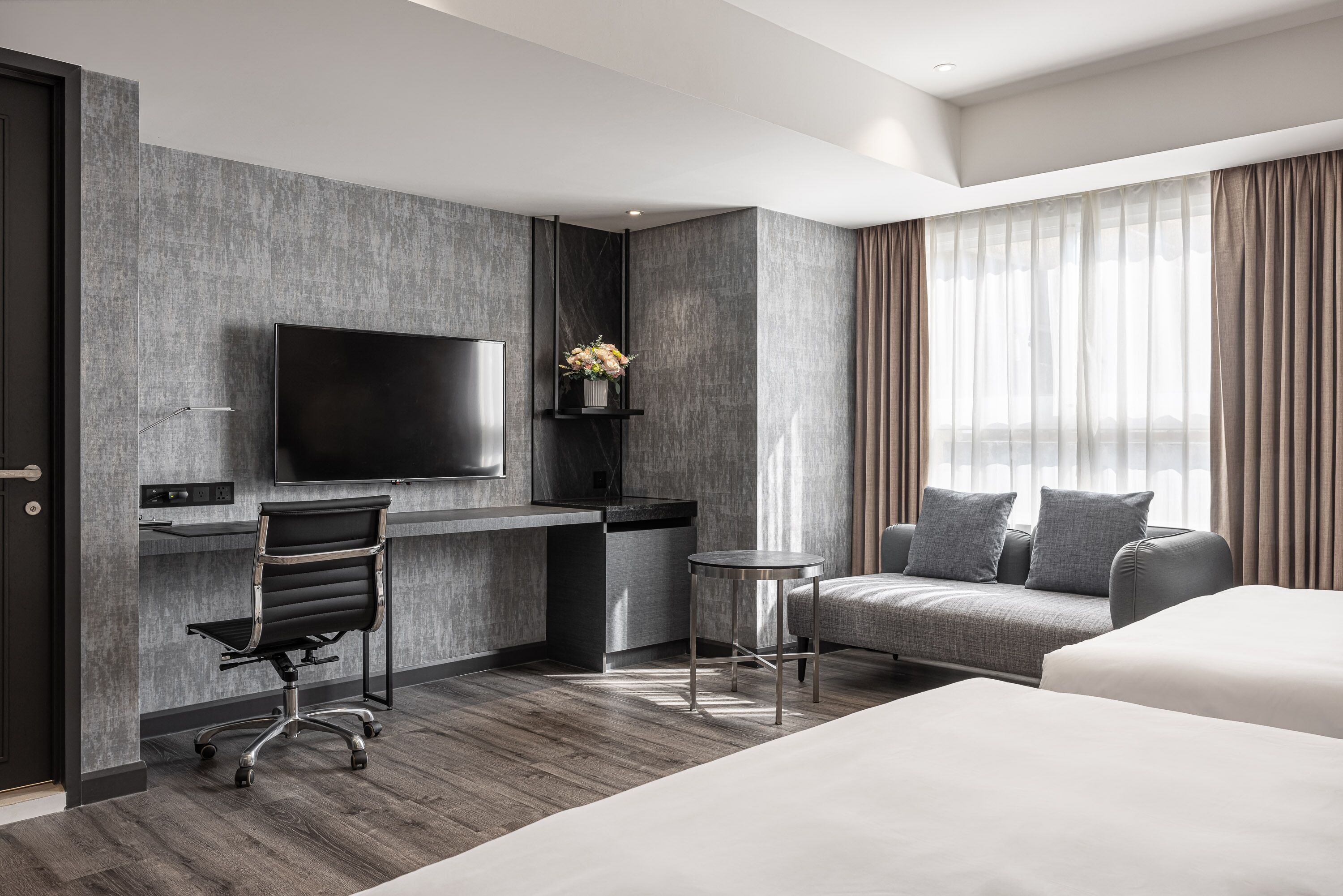 deluxe family room | minibar, in-room safe, desk, laptop workspace