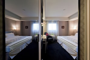 Down comforters, blackout drapes, free WiFi, bed sheets