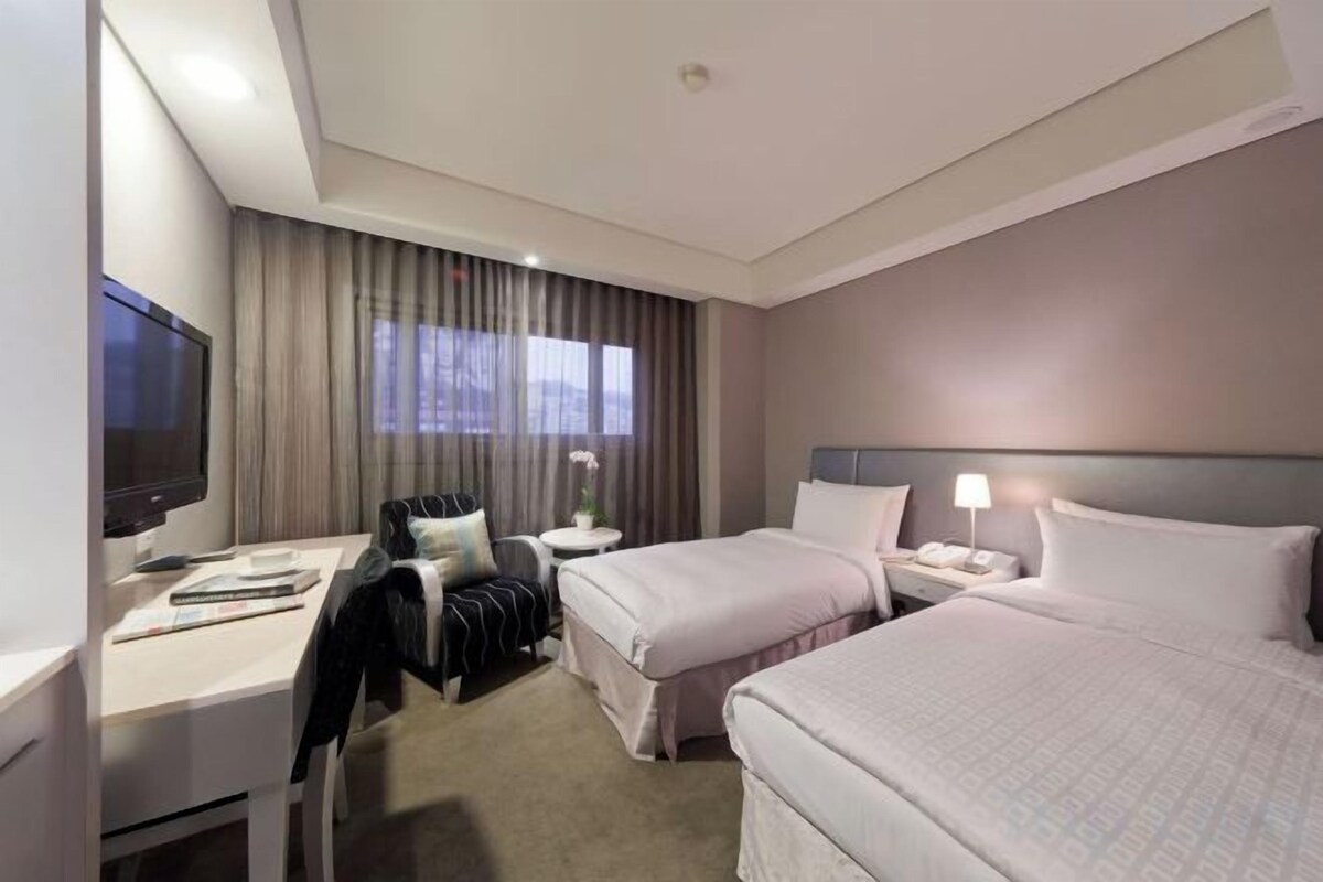 Down comforters, blackout drapes, WiFi (free), bed sheets