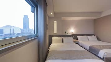 Edredón, cortinas blackout, wifi gratis y ropa de cama