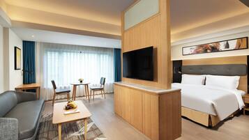 1 King Bed Suite Additional Living Area | Hypo-allergenic bedding available, down comforters, minibar