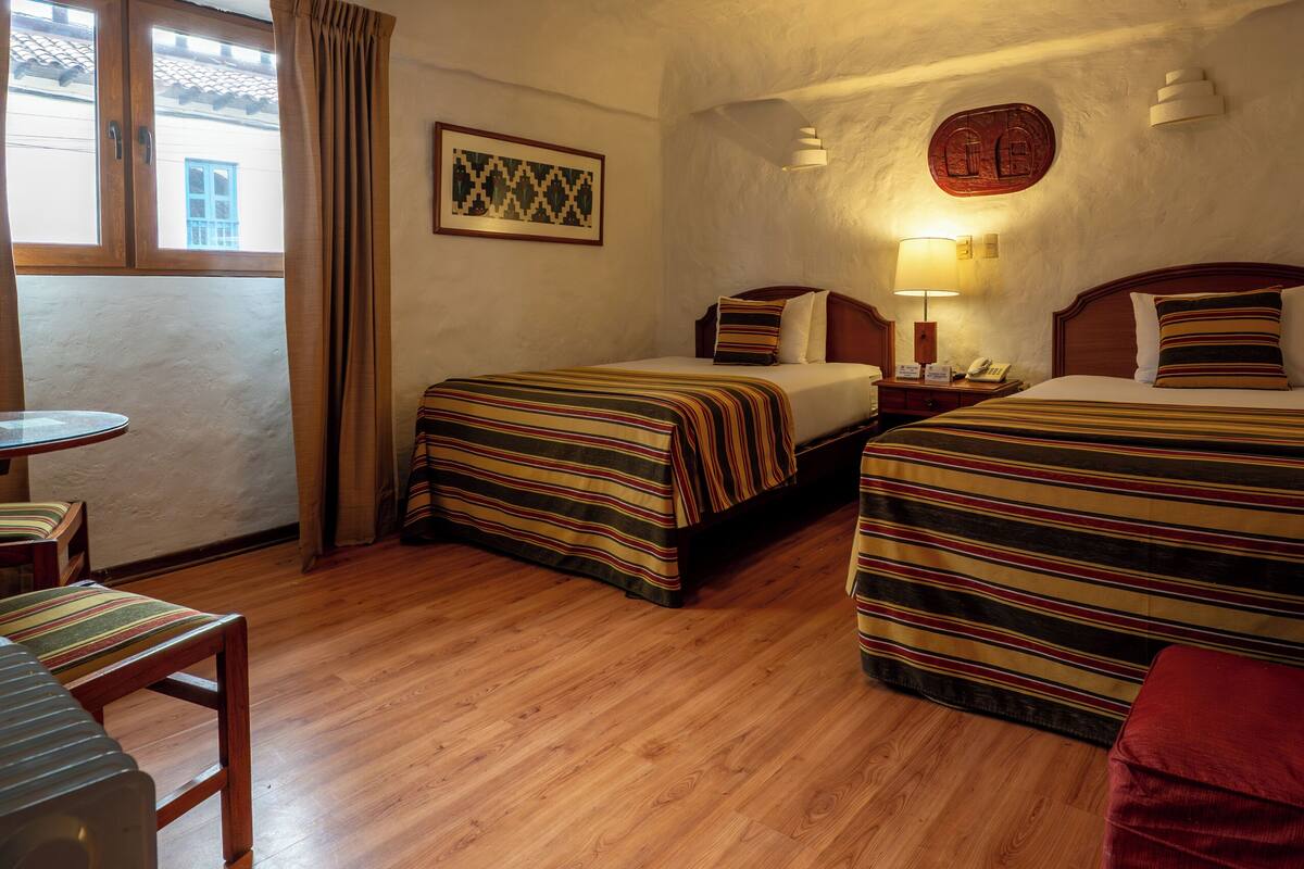 Double or Twin Room, 1 Double or 2 Twin Beds | In-room safe, blackout drapes, WiFi (free), bed sheets
