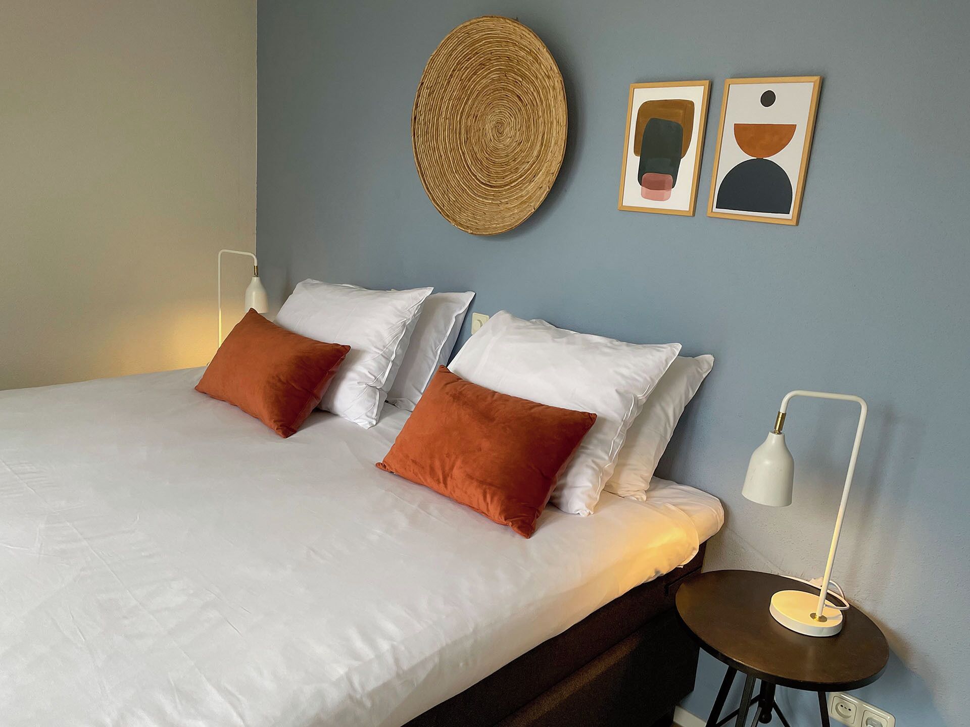 Premium bedding, desk, laptop workspace, soundproofing