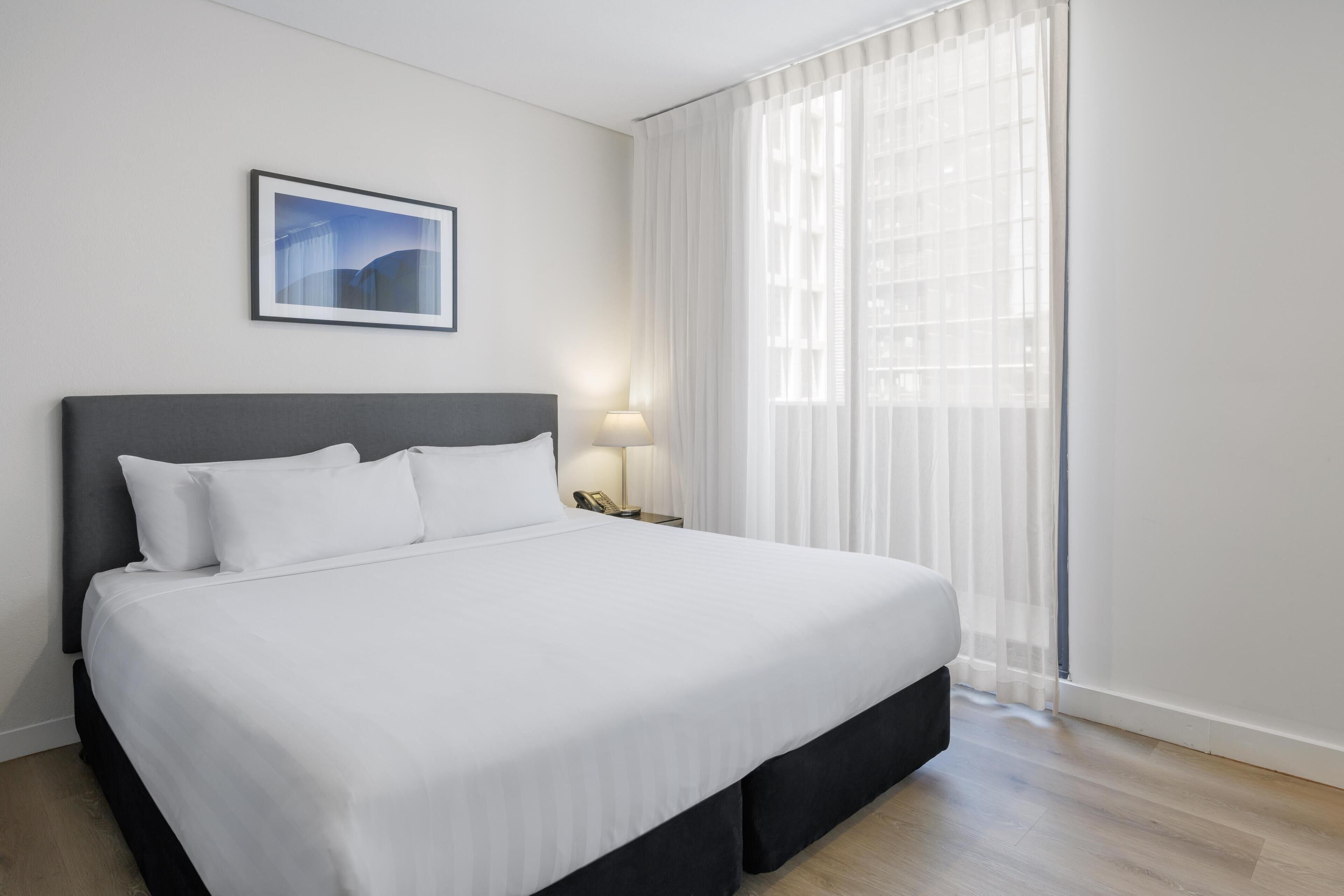 Premium bedding, desk, blackout curtains, soundproofing