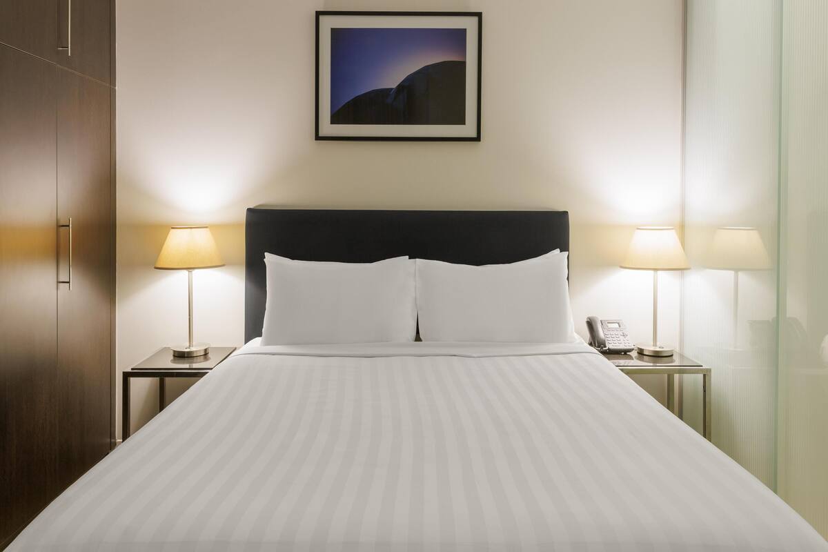 Premium bedding, desk, blackout curtains, soundproofing