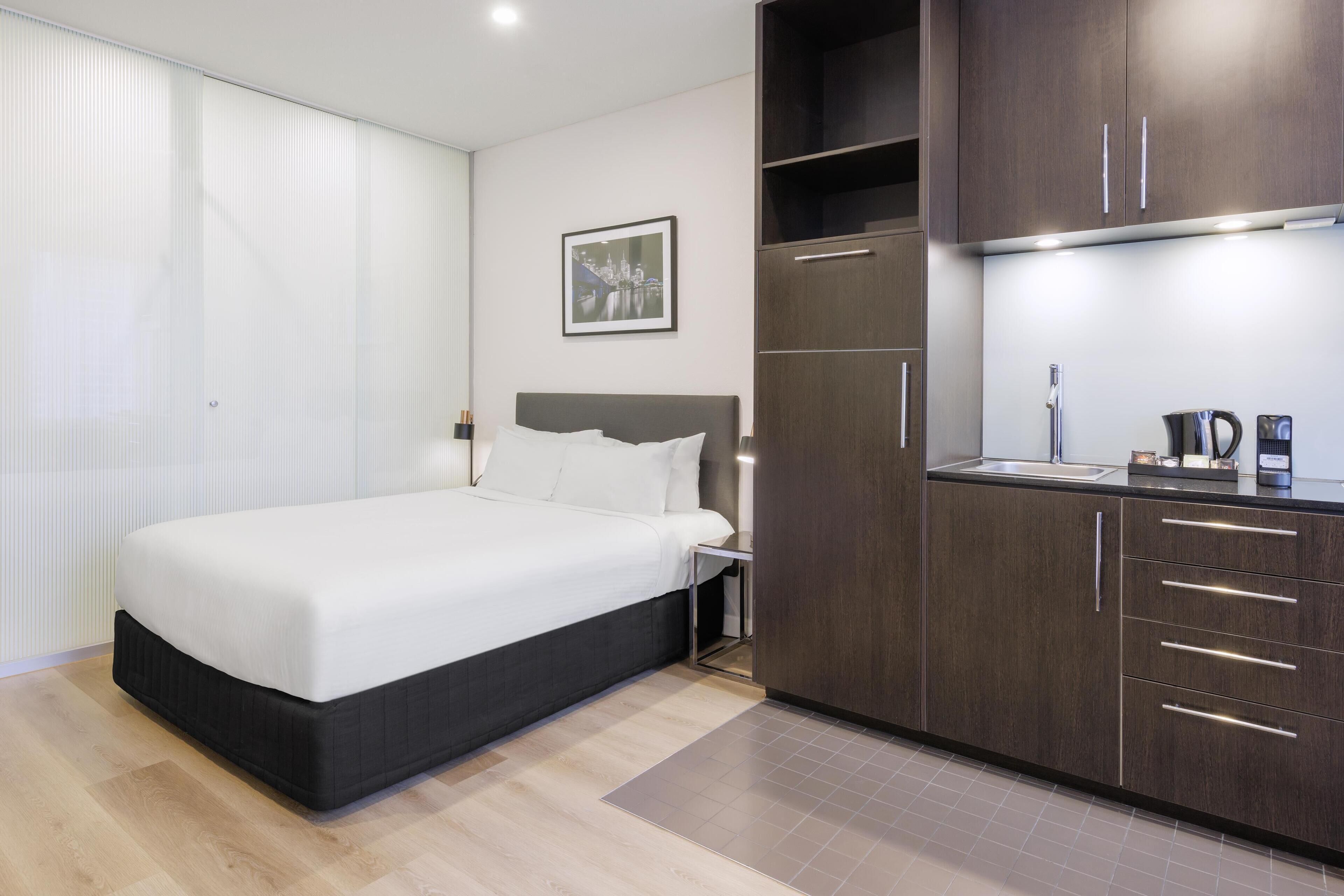 Premium bedding, desk, blackout curtains, soundproofing