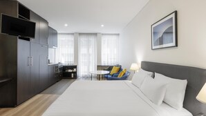 Premium bedding, desk, blackout curtains, soundproofing