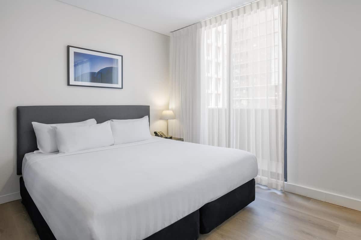 Premium bedding, desk, blackout curtains, soundproofing