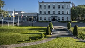 A large, historic building with a symmetrical facade, multiple windows, and a central entrance with steps leading up to it. - Dunboyne Castle Hotel & Spa (Dunboyne)