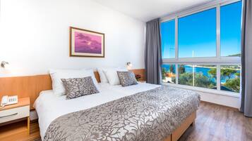 Desk, blackout curtains, free cots/infant beds, rollaway beds