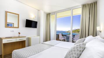Double or Twin Room, Balcony, Sea View | Desk, blackout drapes, free cribs/infant beds, rollaway beds