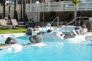 Outdoor pool, open 10 AM to 6 PM, pool loungers