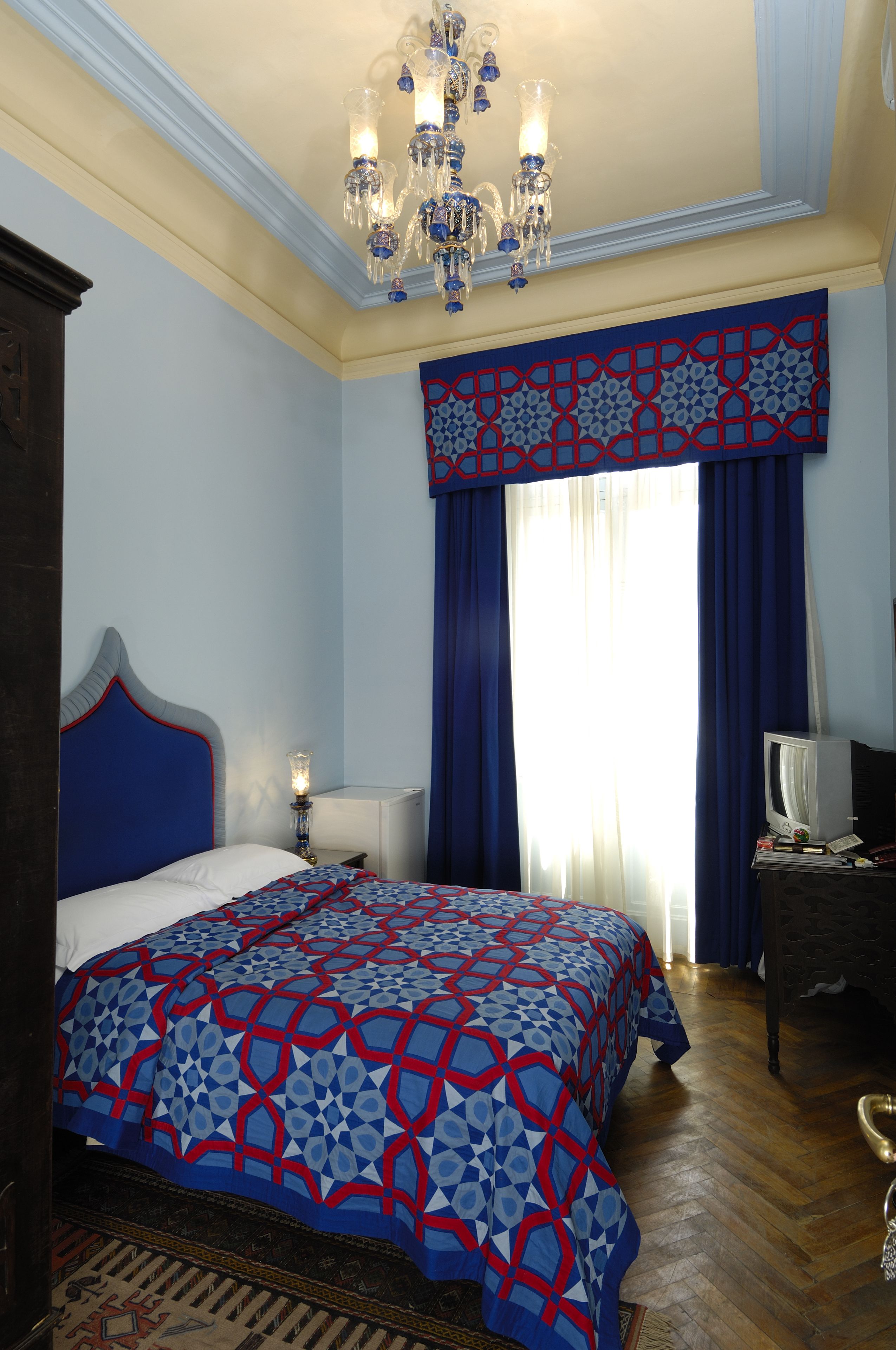 premium bedding, desk, blackout curtains, free internet