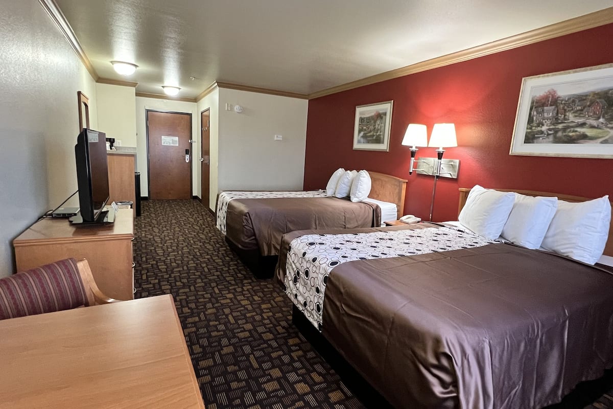 standard room, 2 queen beds, non smoking | desk, iron/ironing board, free cots/infant beds, rollaway beds