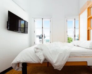 Room | Premium bedding, minibar, individually decorated, individually furnished - Hôtel Atypiq (Québec City)
