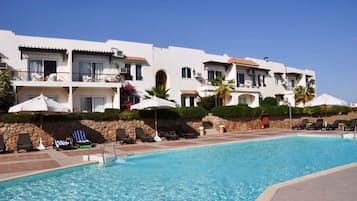 2 outdoor pools, pool umbrellas, pool loungers