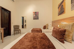 Economy Twin Room, Ground Floor | Premium bedding, down duvets, minibar, in-room safe - Hotel Casa La Fe By BespokeColombia (Cartagena)