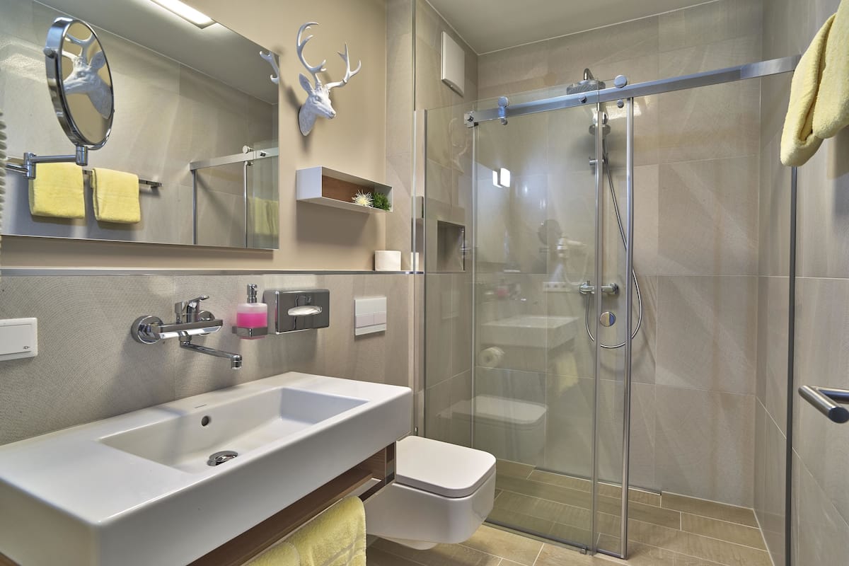 classic quadruple room, 1 bedroom, balcony, garden view | bathroom | shower, free toiletries, hair dryer, towels