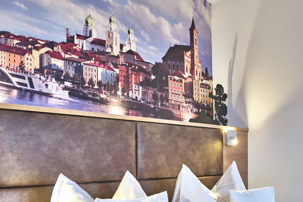 comfort suite, 1 king bed, balcony, garden view | hypo-allergenic bedding, individually furnished, desk, blackout curtains