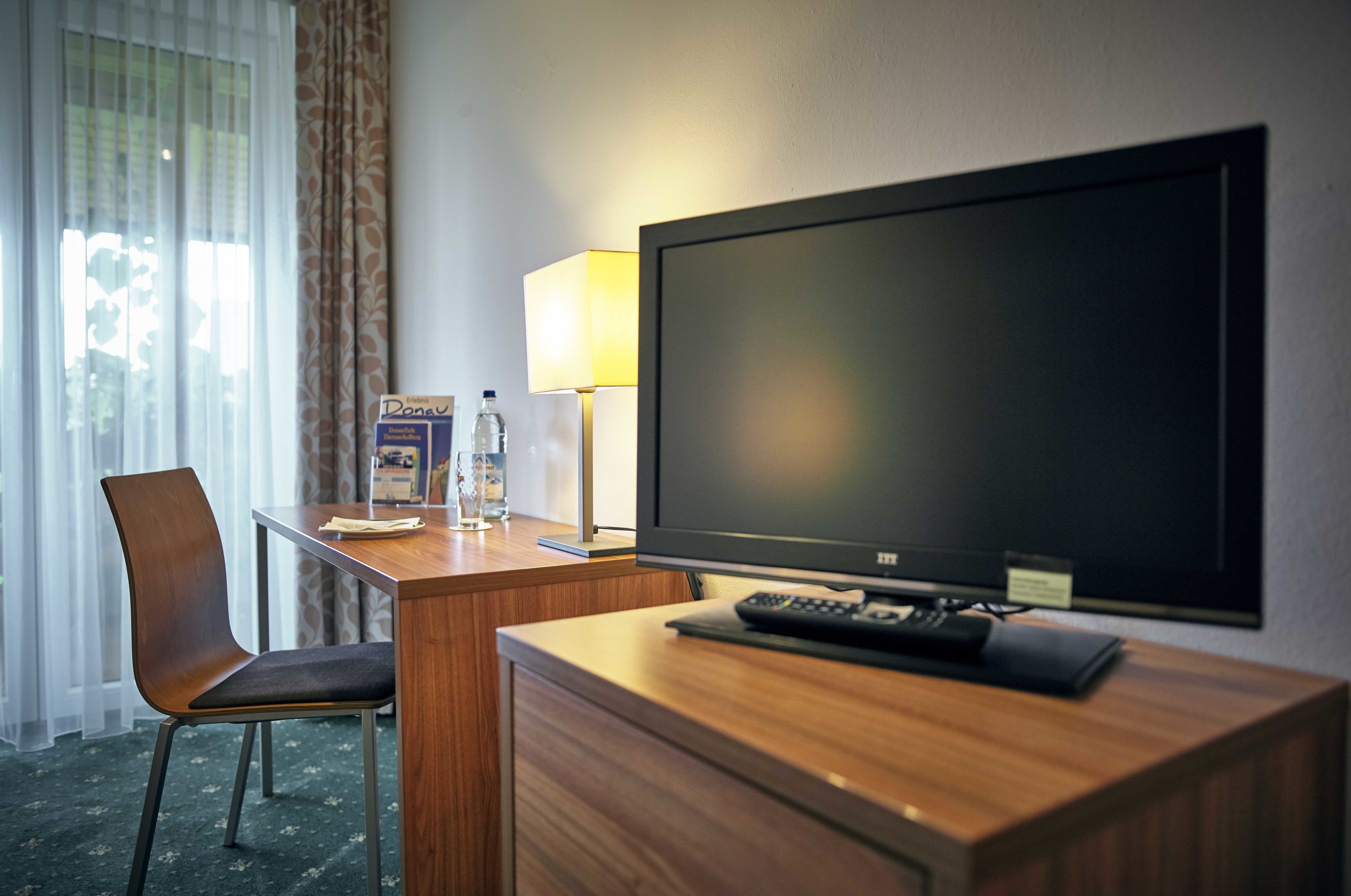 standard single room | living area | 32-inch flat-screen tv with satellite channels, tv