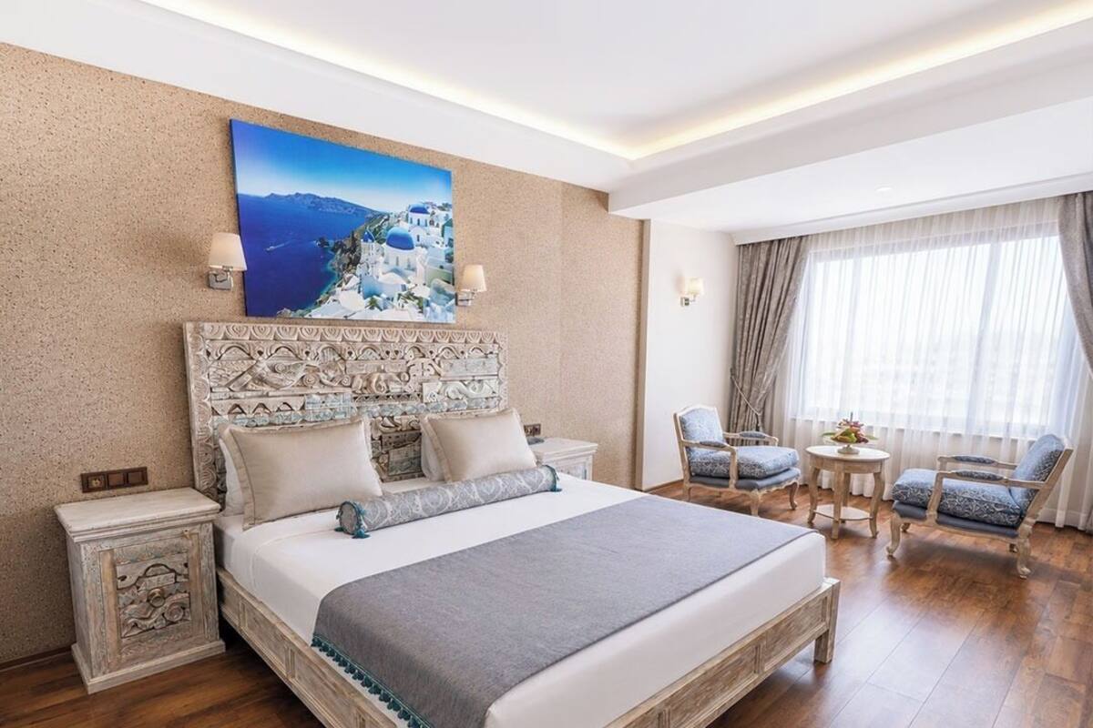 Studio suite, 1 slaapkamer, uitzicht op zee | Luxe beddengoed, een minibar, een kluis op de kamer, geluiddichte muren