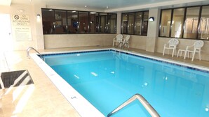 An indoor swimming pool with clear pool rules and no lifeguard on duty. - Comfort Suites Twinsburg (Twinsburg)