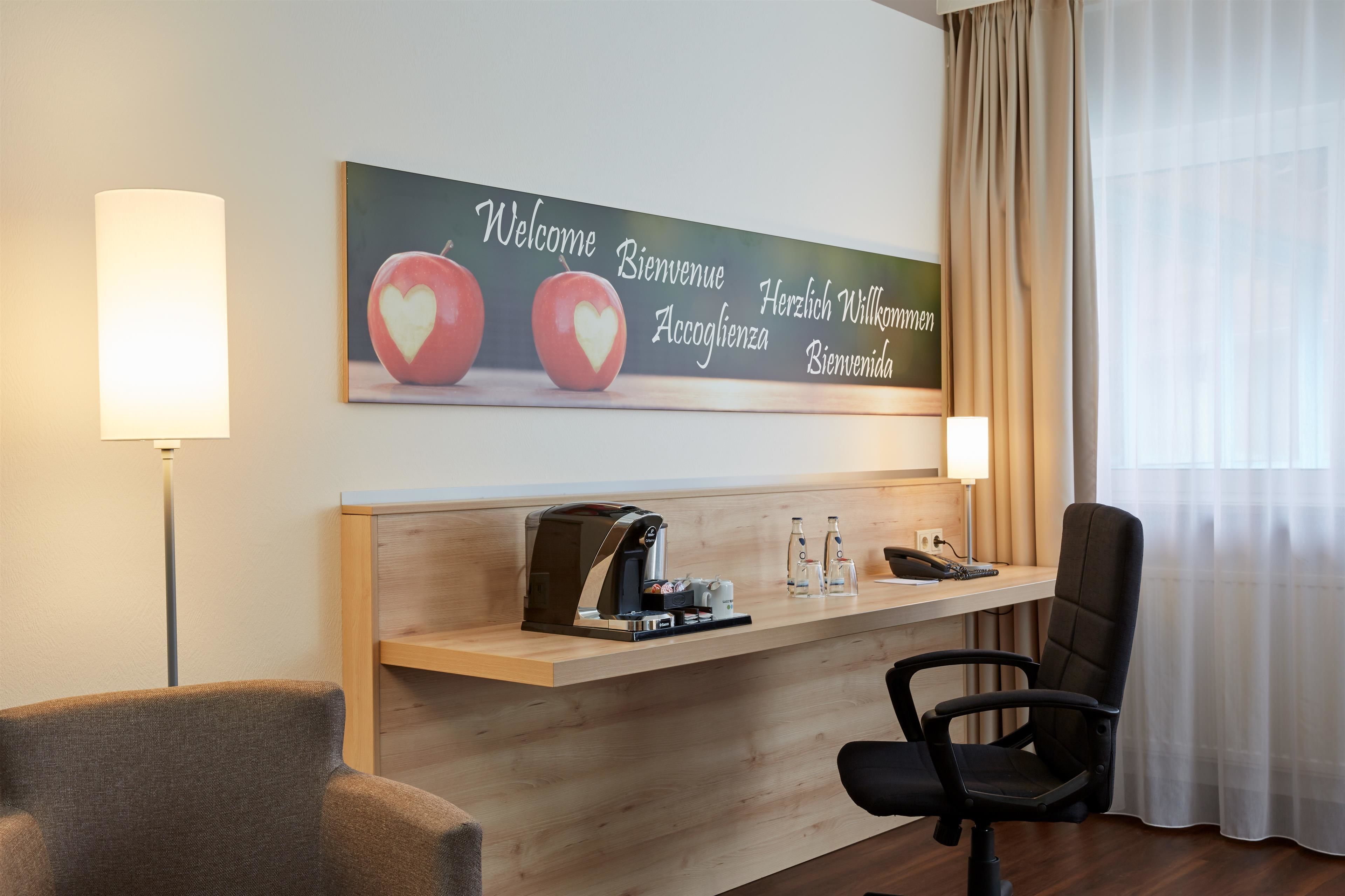 premium bedding, down duvets, desk, blackout curtains