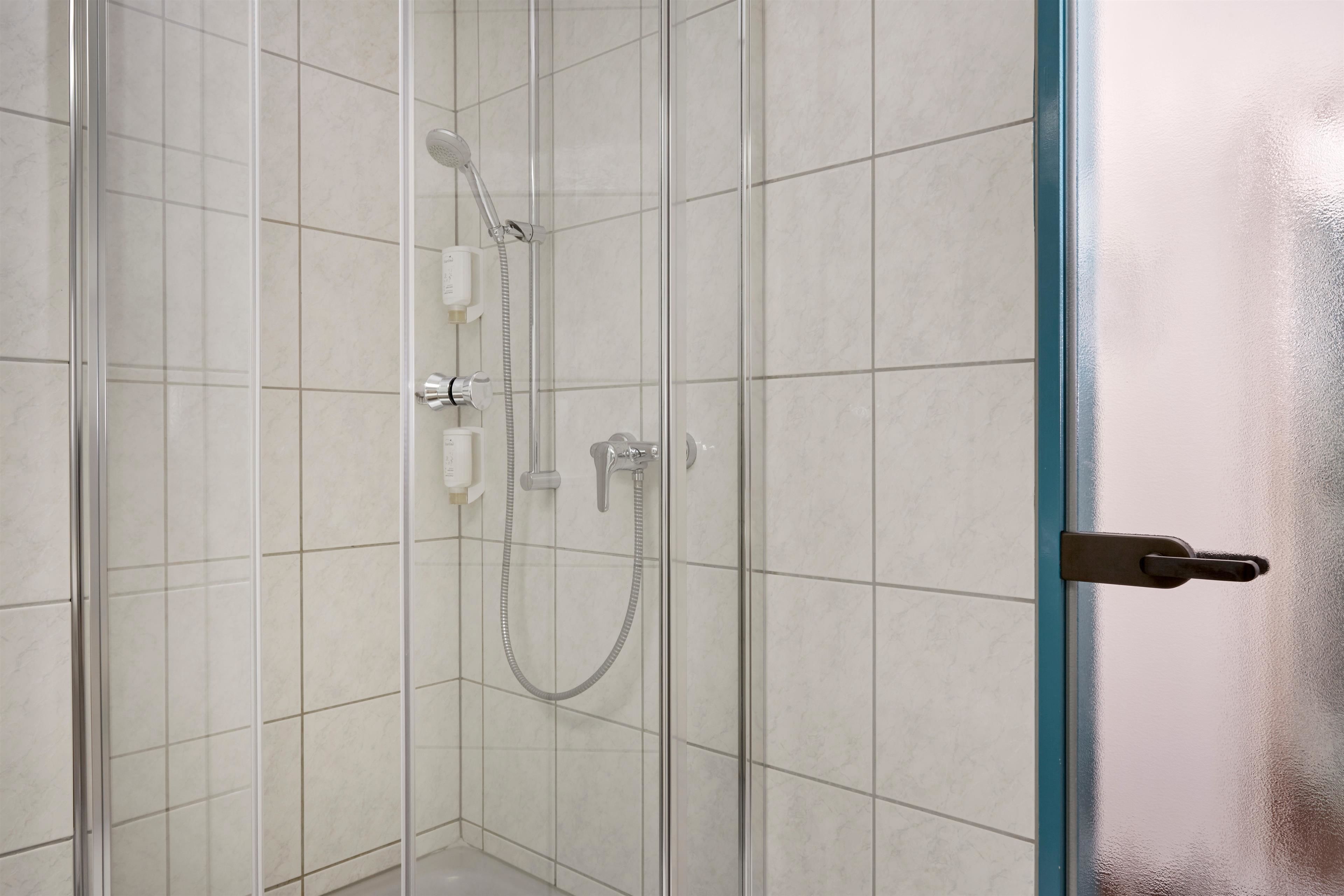 shower, free toiletries, hair dryer, bathrobes