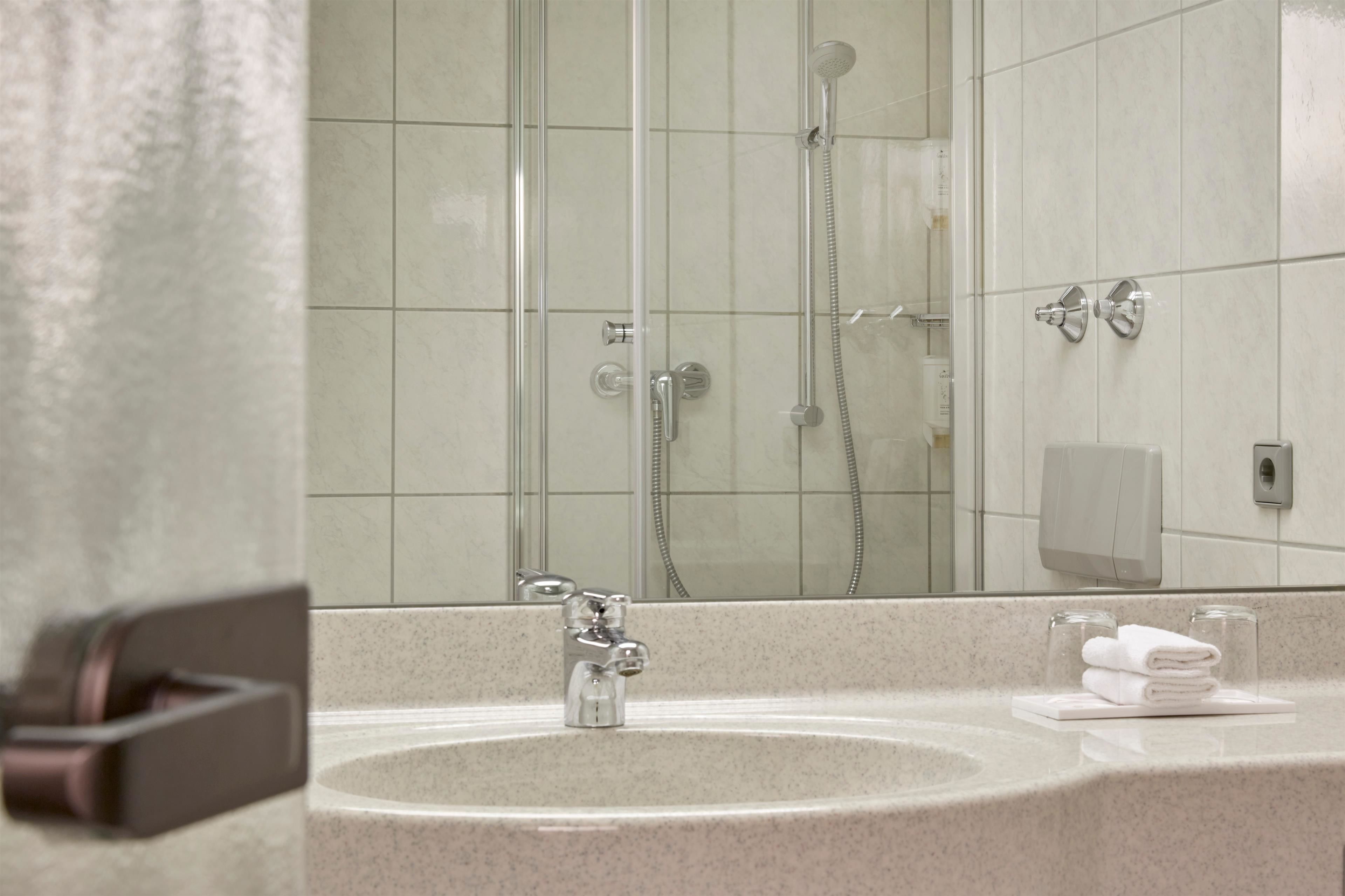 shower, free toiletries, hair dryer, bathrobes