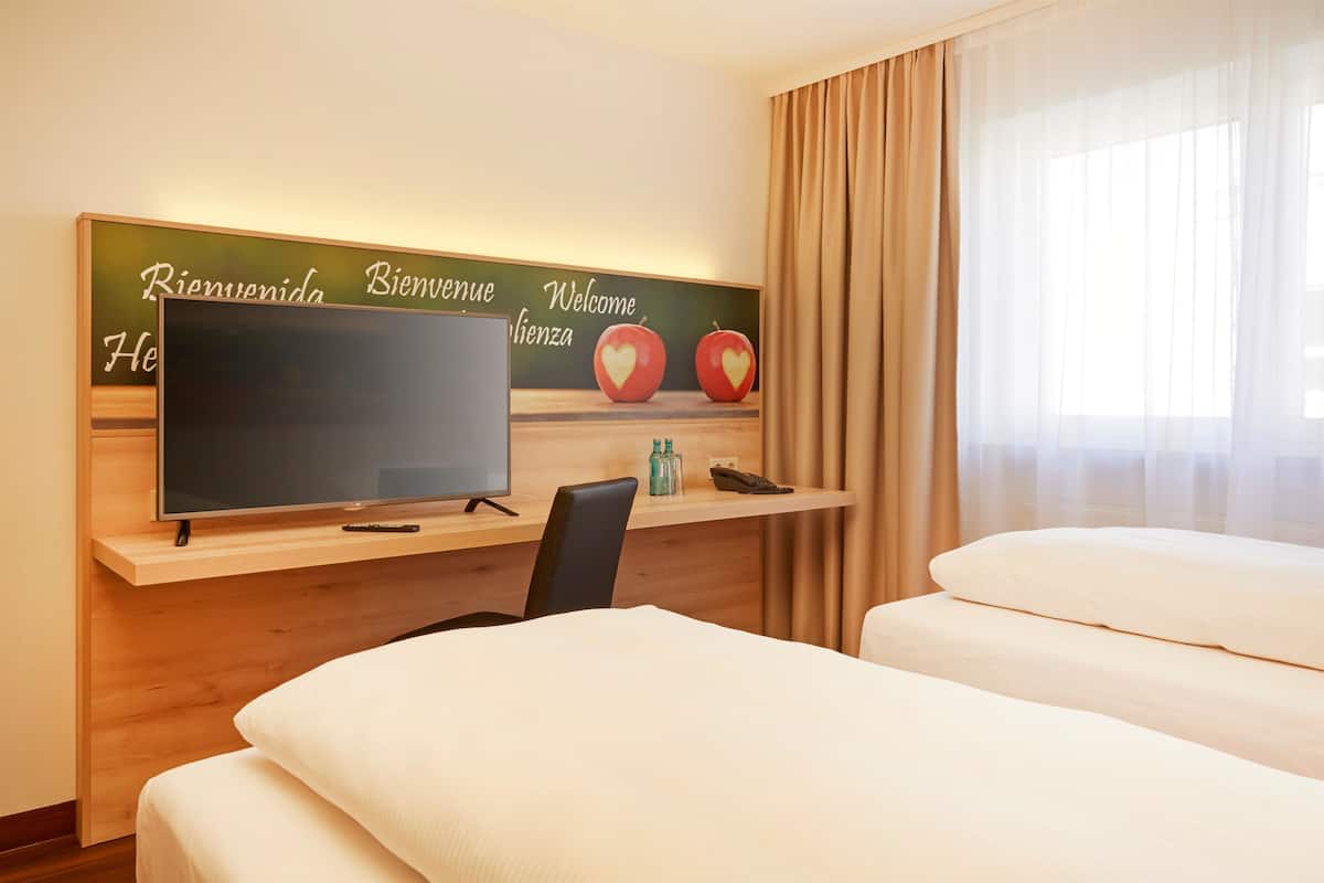 Premium bedding, down comforters, desk, blackout drapes