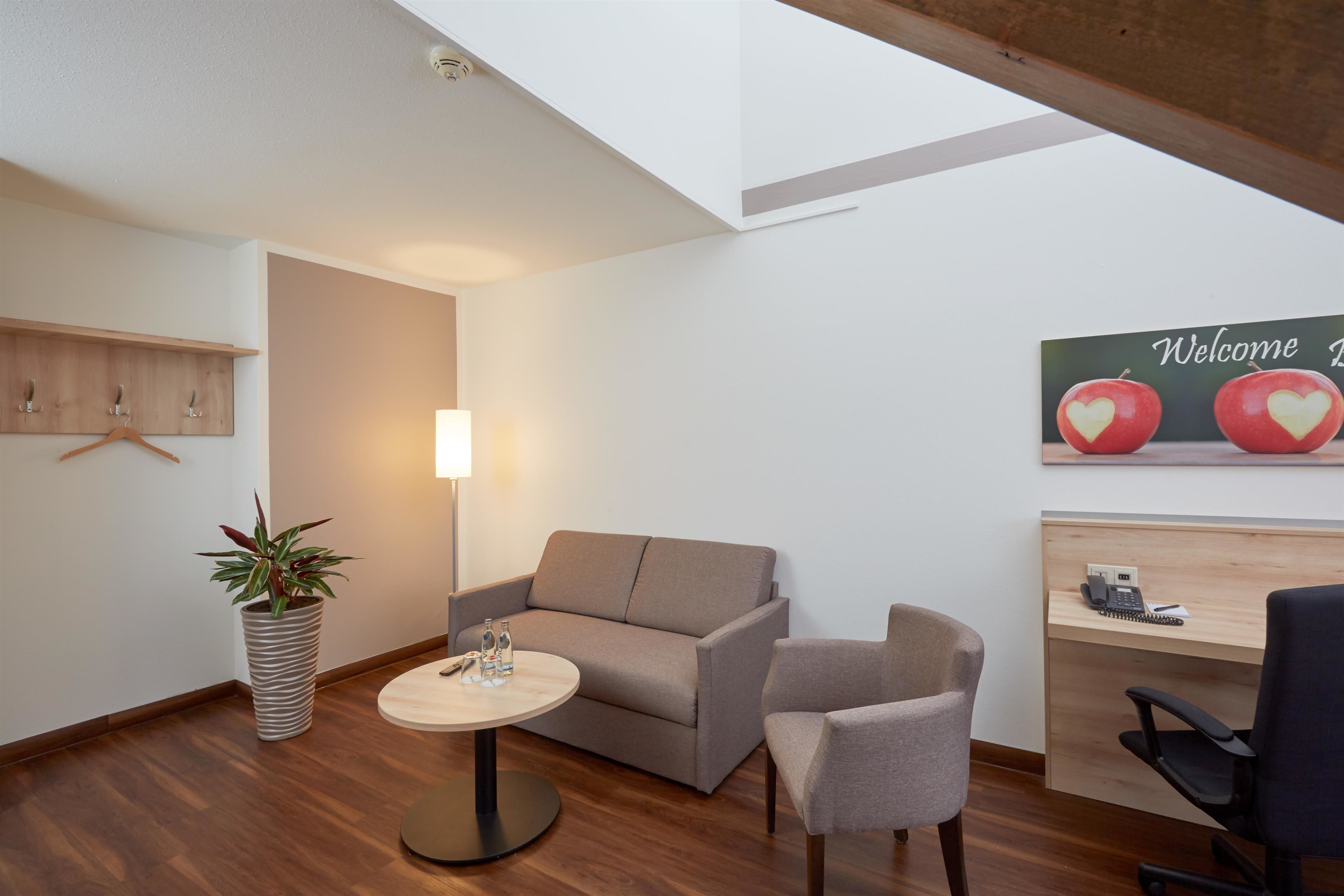 premium bedding, down duvets, desk, blackout curtains