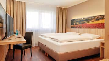 Komfort Doppelzimmer | Hochwertige Bettwaren, Daunenbettdecken, Schreibtisch