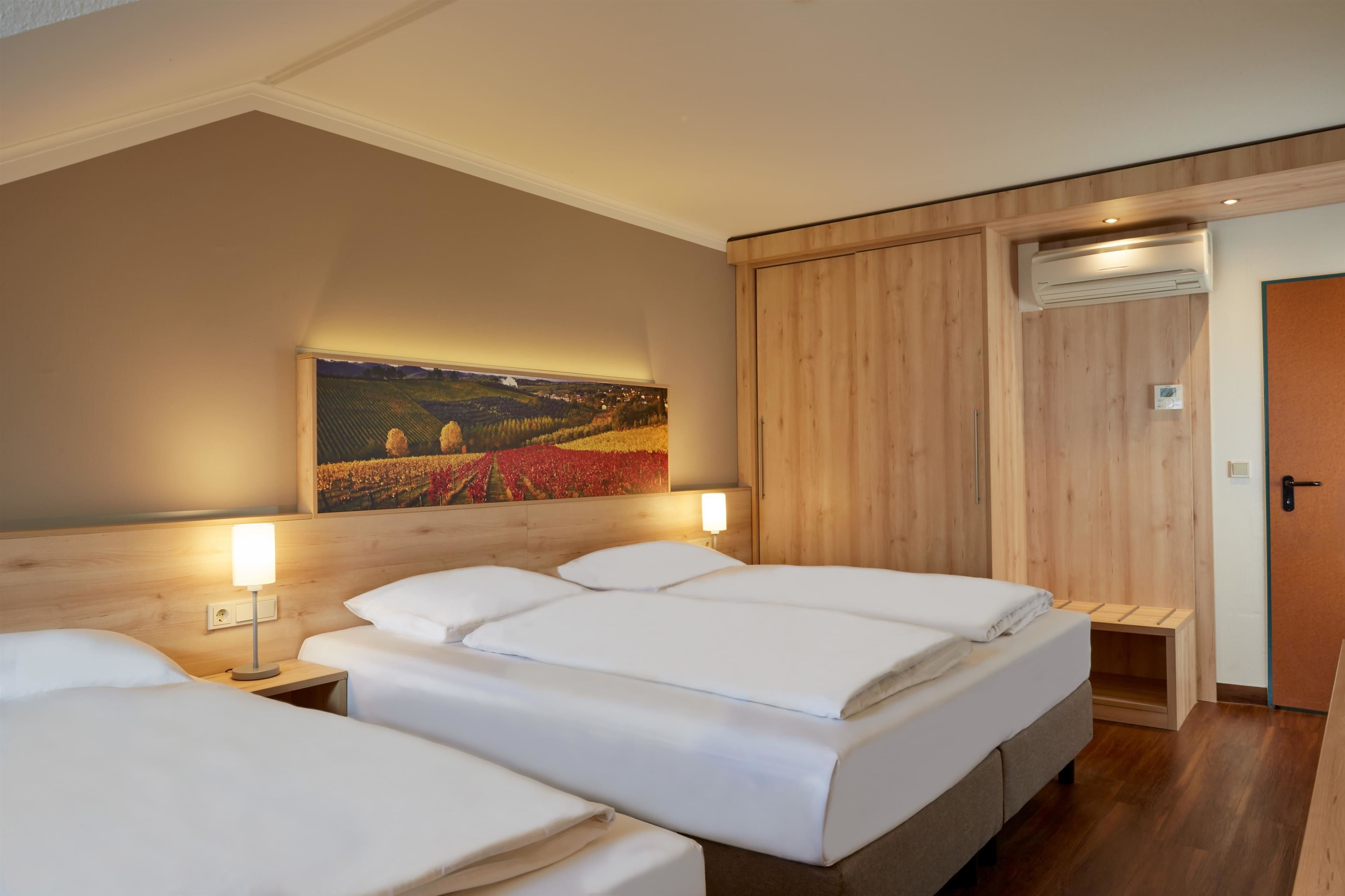 premium bedding, down duvets, desk, blackout curtains