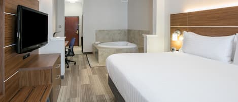 Habitación estándar, 1 cama King size, hidromasaje | Caja de seguridad en la habitación y escritorio