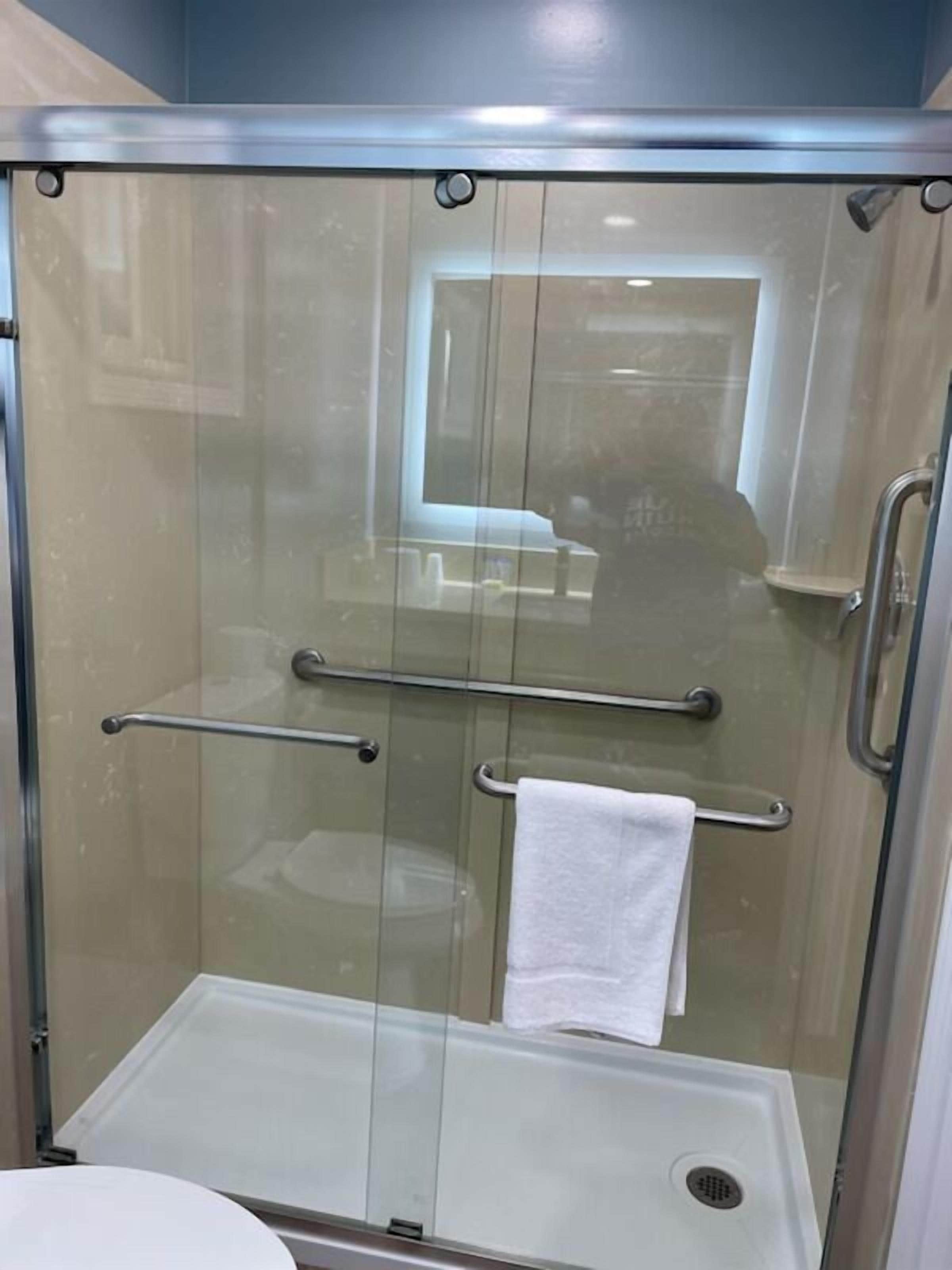 Shower, towels, soap, shampoo