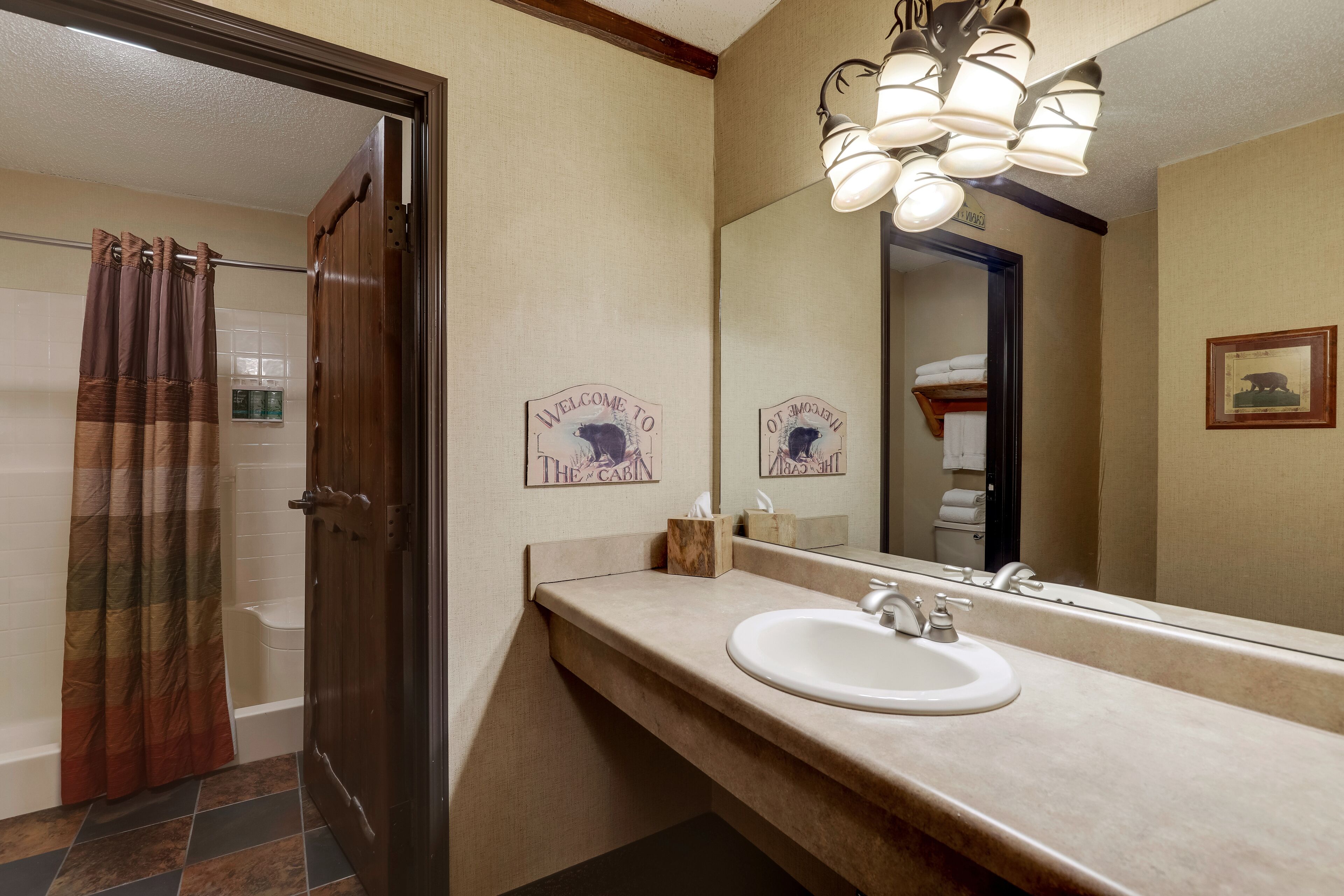superior suite, 1 king bed with sofa bed, hot tub | bathroom | combined shower/bathtub, free toiletries, hair dryer, towels
