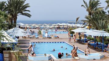 3 outdoor pools, pool umbrellas, pool loungers