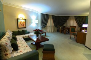 Senior Suite | Minibar, in-room safe, desk, free WiFi