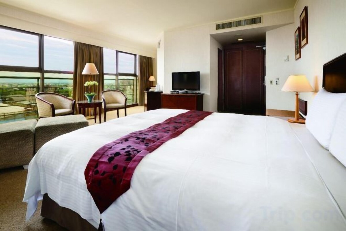 Blackout drapes, soundproofing, iron/ironing board (on request)