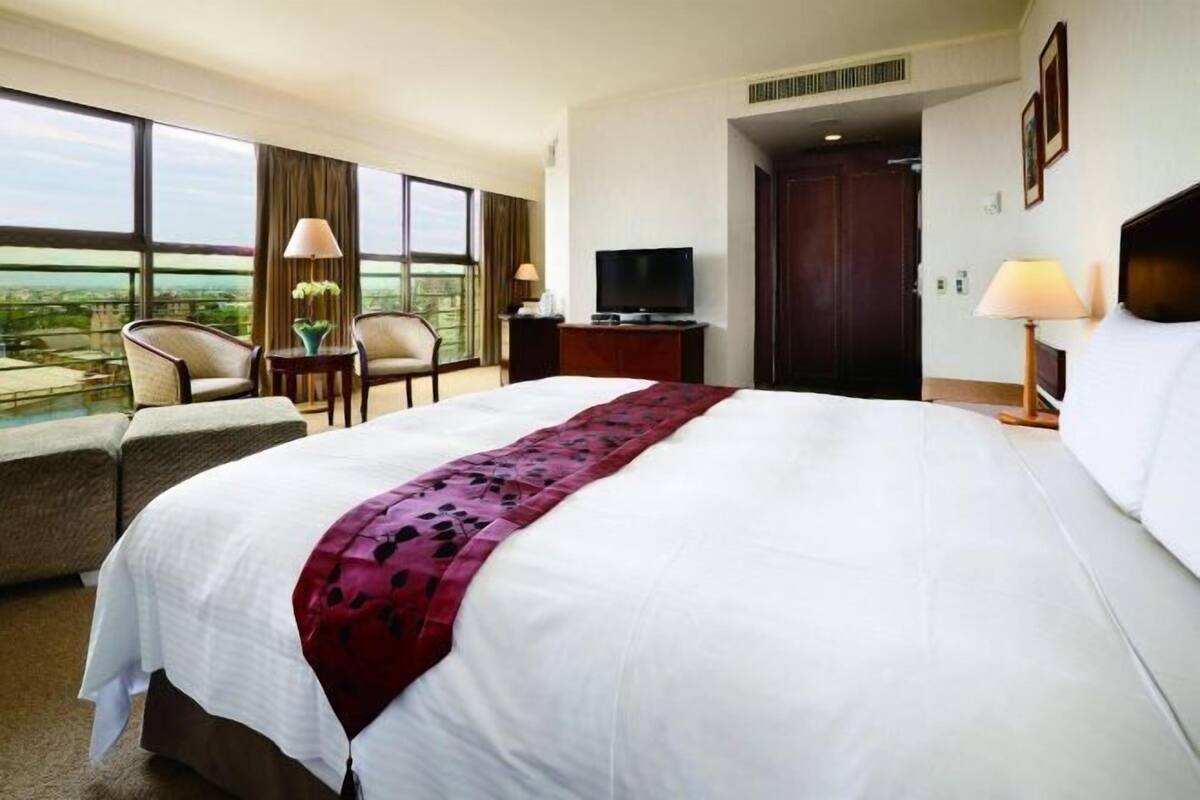 Blackout drapes, soundproofing, iron/ironing board (on request)