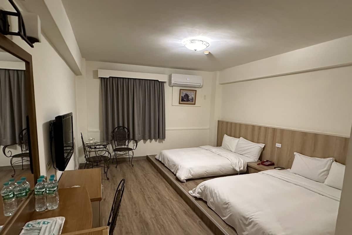Yawan Quadruple Room.