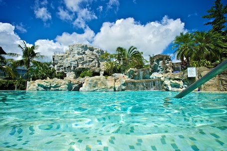 Outdoor pool, open 8:30 AM to 5:00 PM, pool umbrellas, sun loungers