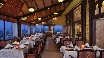 3 restaurants, breakfast, lunch, dinner served; Indian cuisine